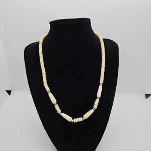 bone bead necklace with silver tone separators